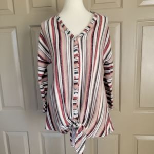 Andree ladies striped bottom knot blouse.